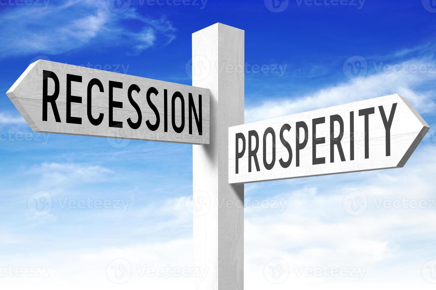 Prosperity, Recession - Wooden Signpost with Two Arrows and Sky in Background photo