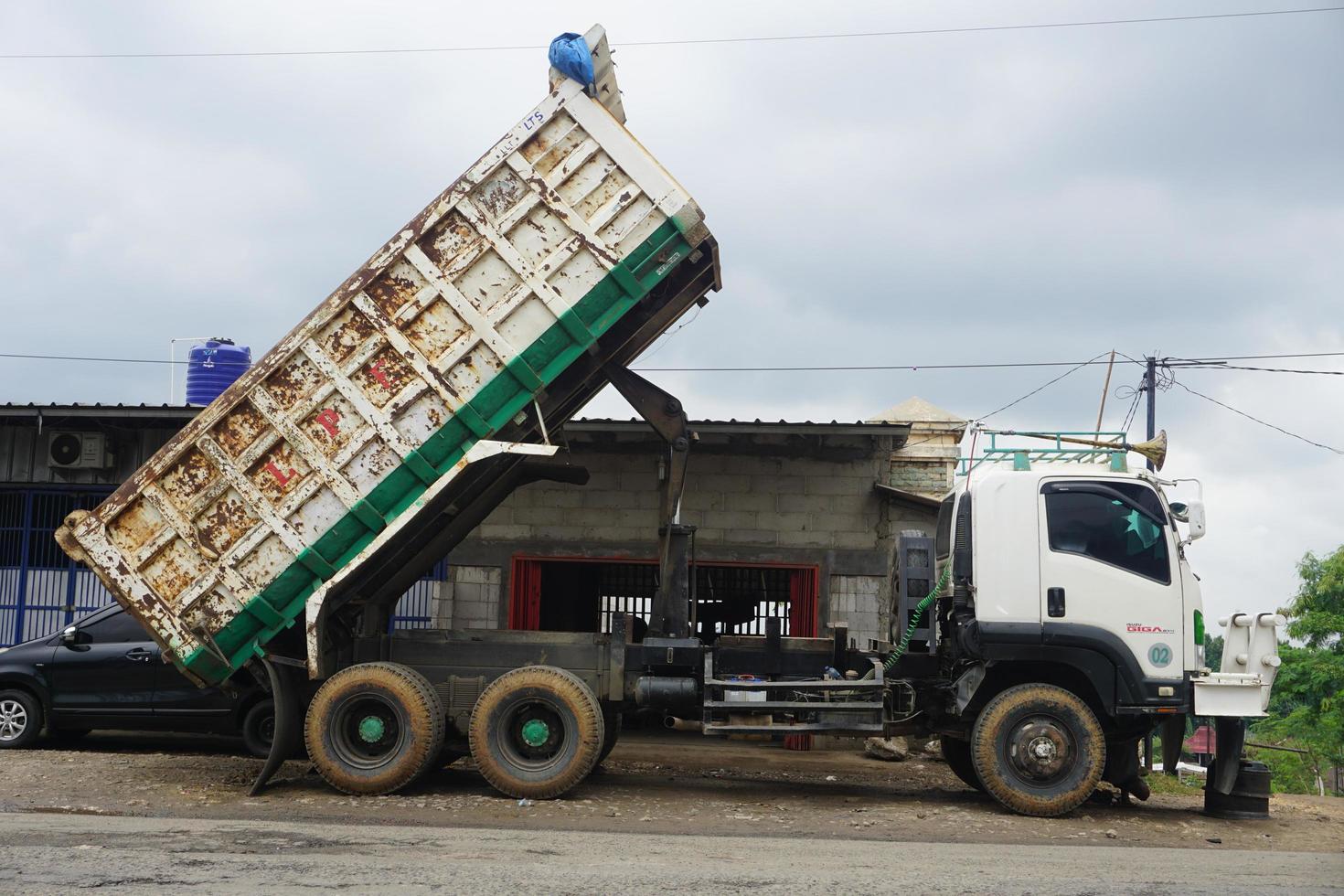 Bogor, Indonesia, 2023 - The process of loading and unloading a truck, photo