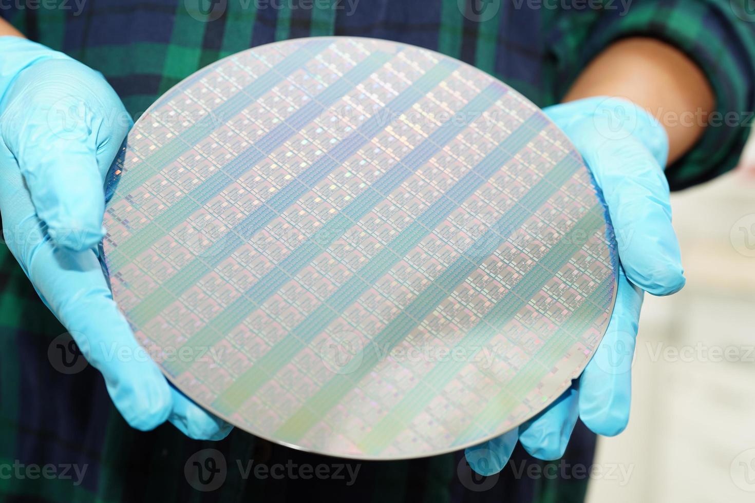 Silicon wafer for manufacturing semiconductor of integrated circuit. photo