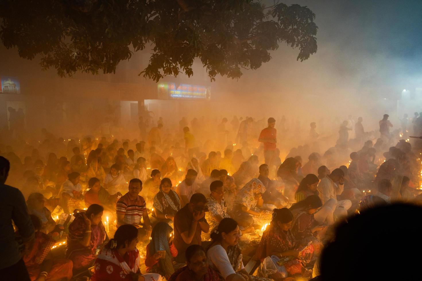 Narayanganj, Dhaka, Bangladesh, on November 12, 2022, Devotees offering prayers at the Shri Shri Lokanath Brahmachari Ashram temple during the Hindu religious fasting festival of Rakher Upobash. photo