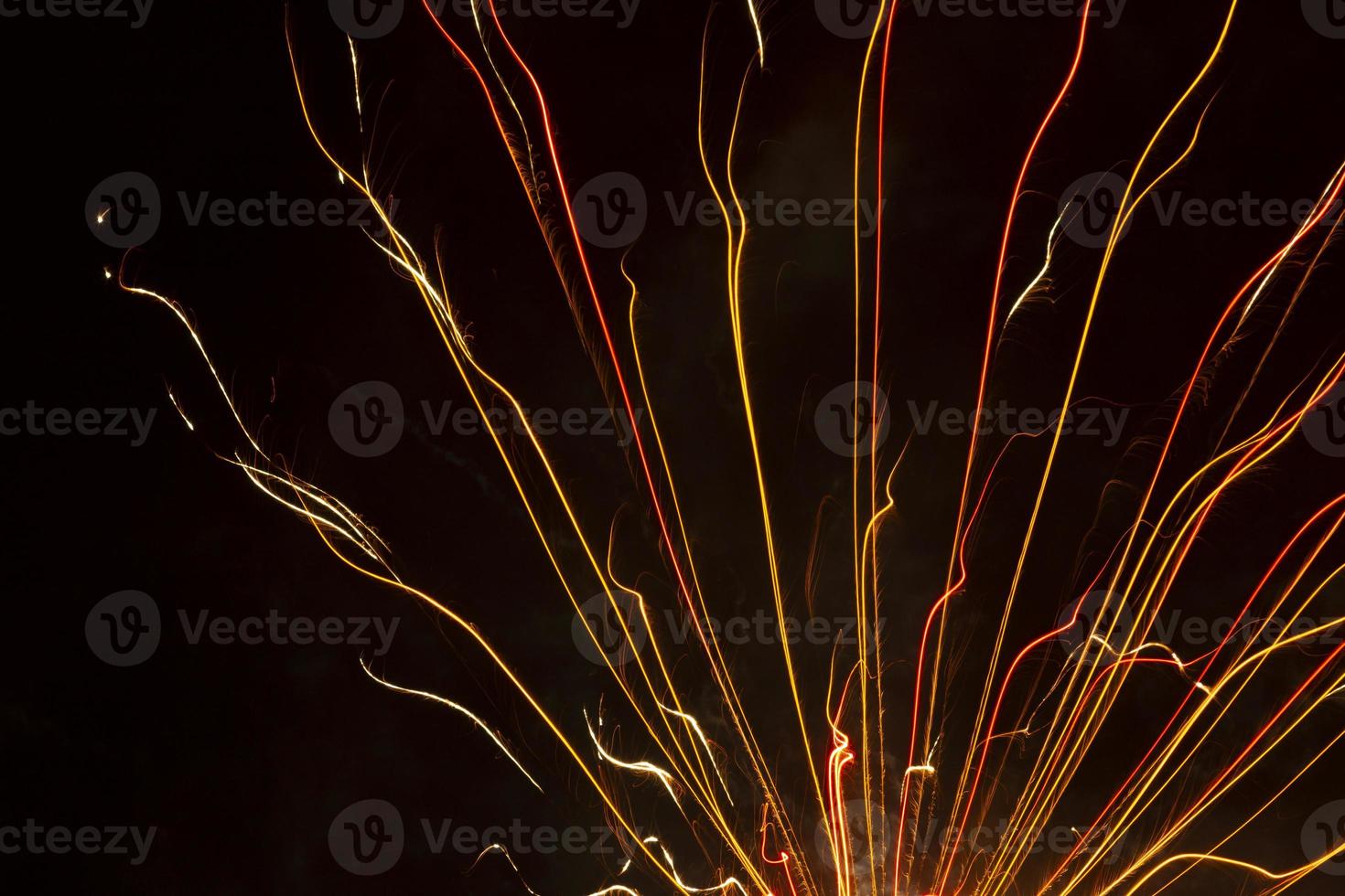 bright firework burst against black sky photo