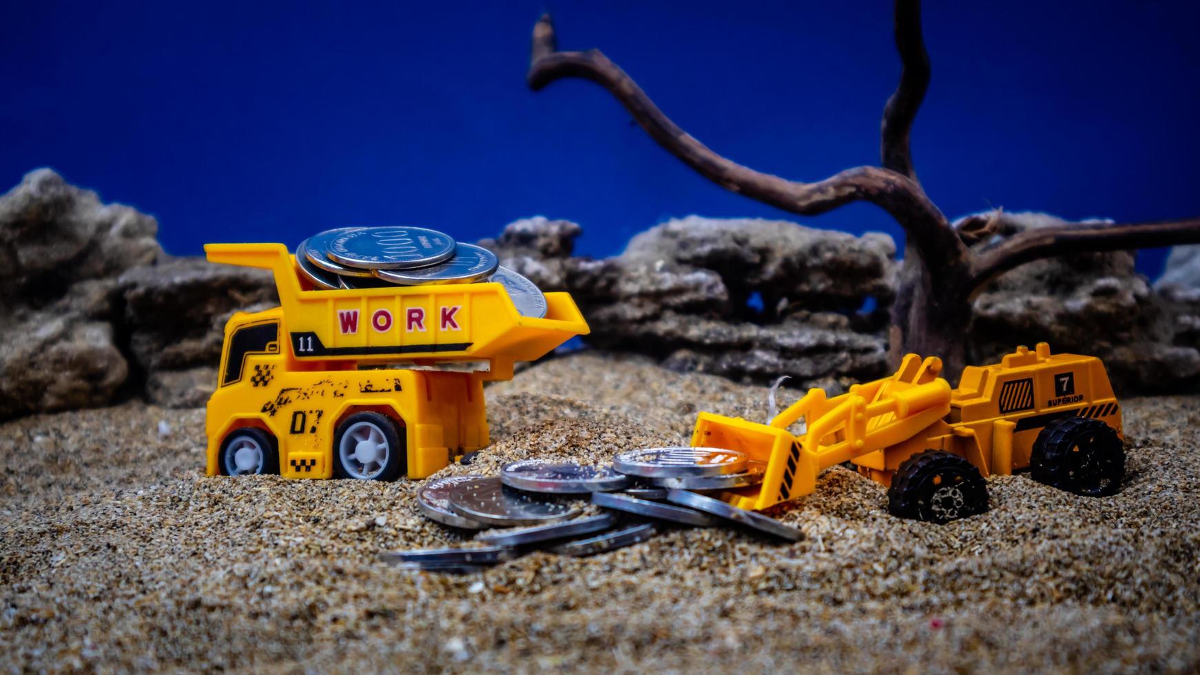 minahasa, Indonesia January 2023, toy trucks transport coins photo