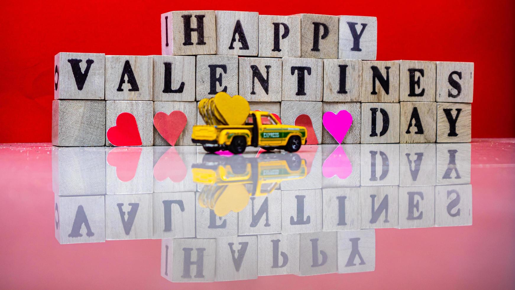 minahasa, Indonesia  January 2023, Happy valentine day on wooden blocks photo