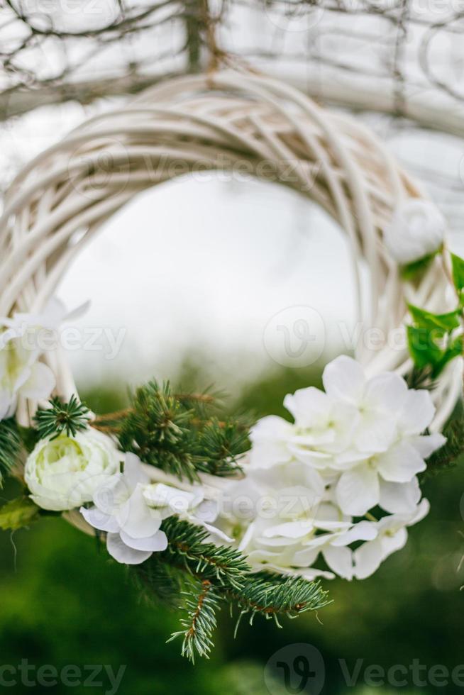 Wedding decor, candles in glass flasks in the forest. photo