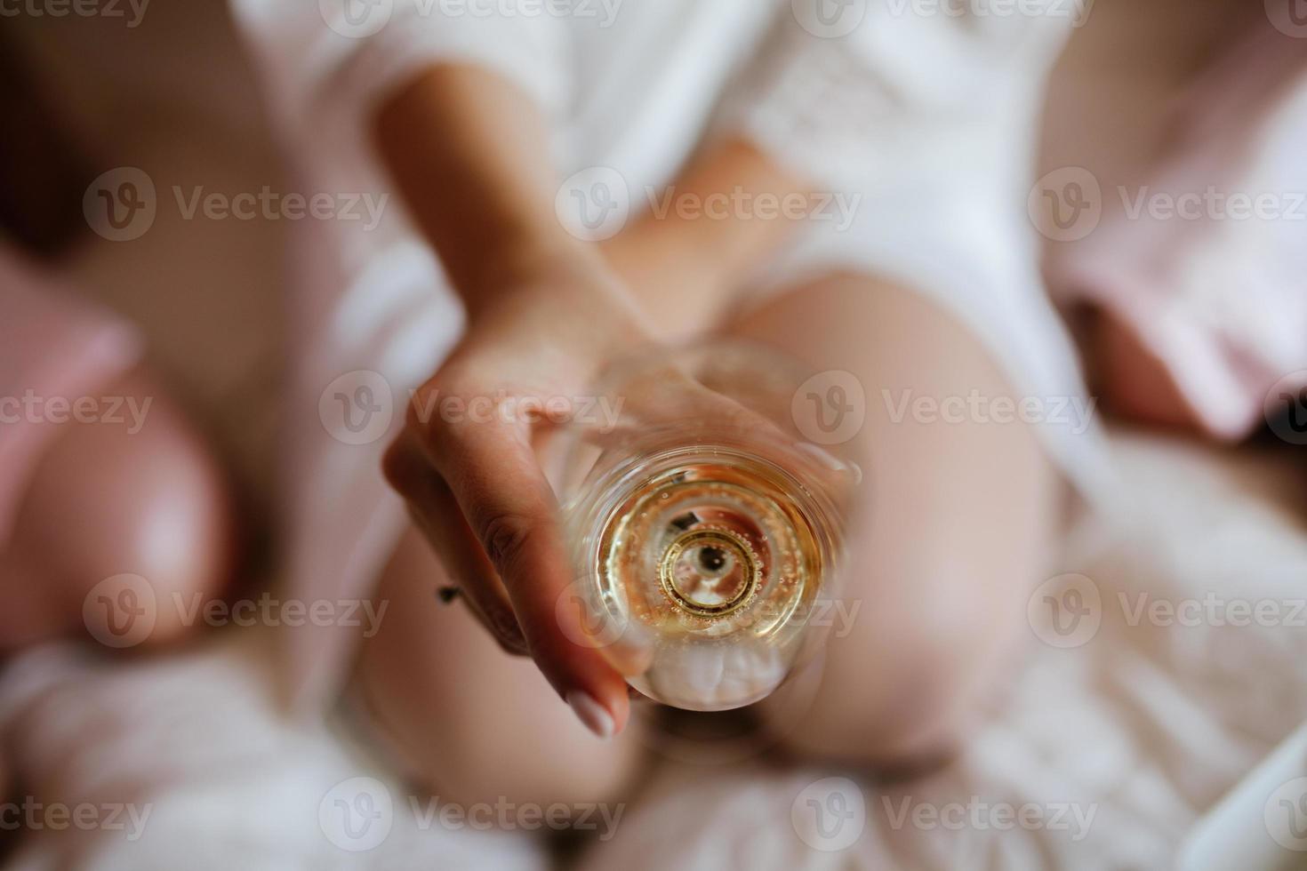 Champagne with ring close up photo