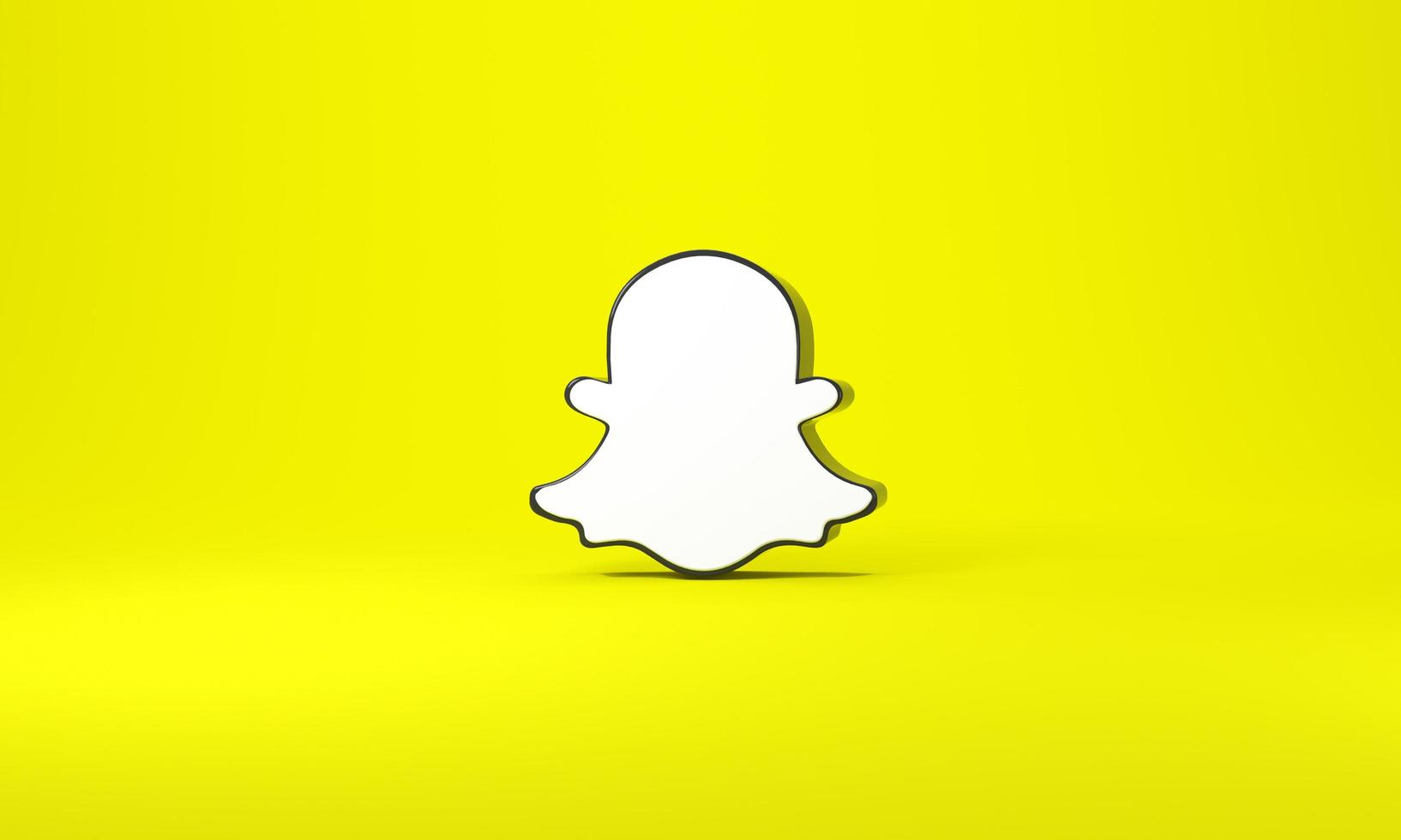 Snapchat logo with space for text and graphics. Yellow background. Madrid, Spain, 2022 photo