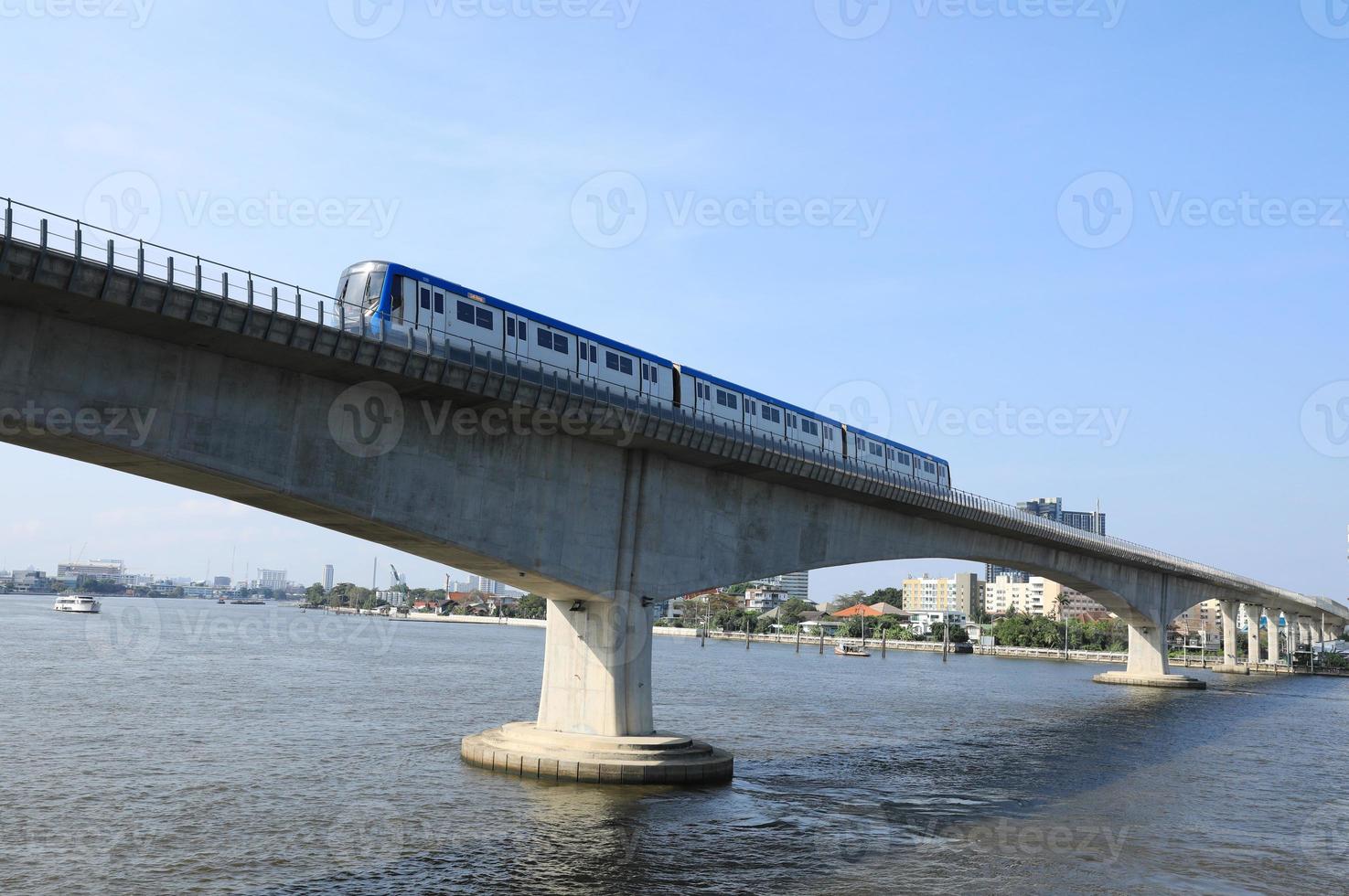 Chaloem Ratchamongkon Line or MRT Blue Line running crossing photo