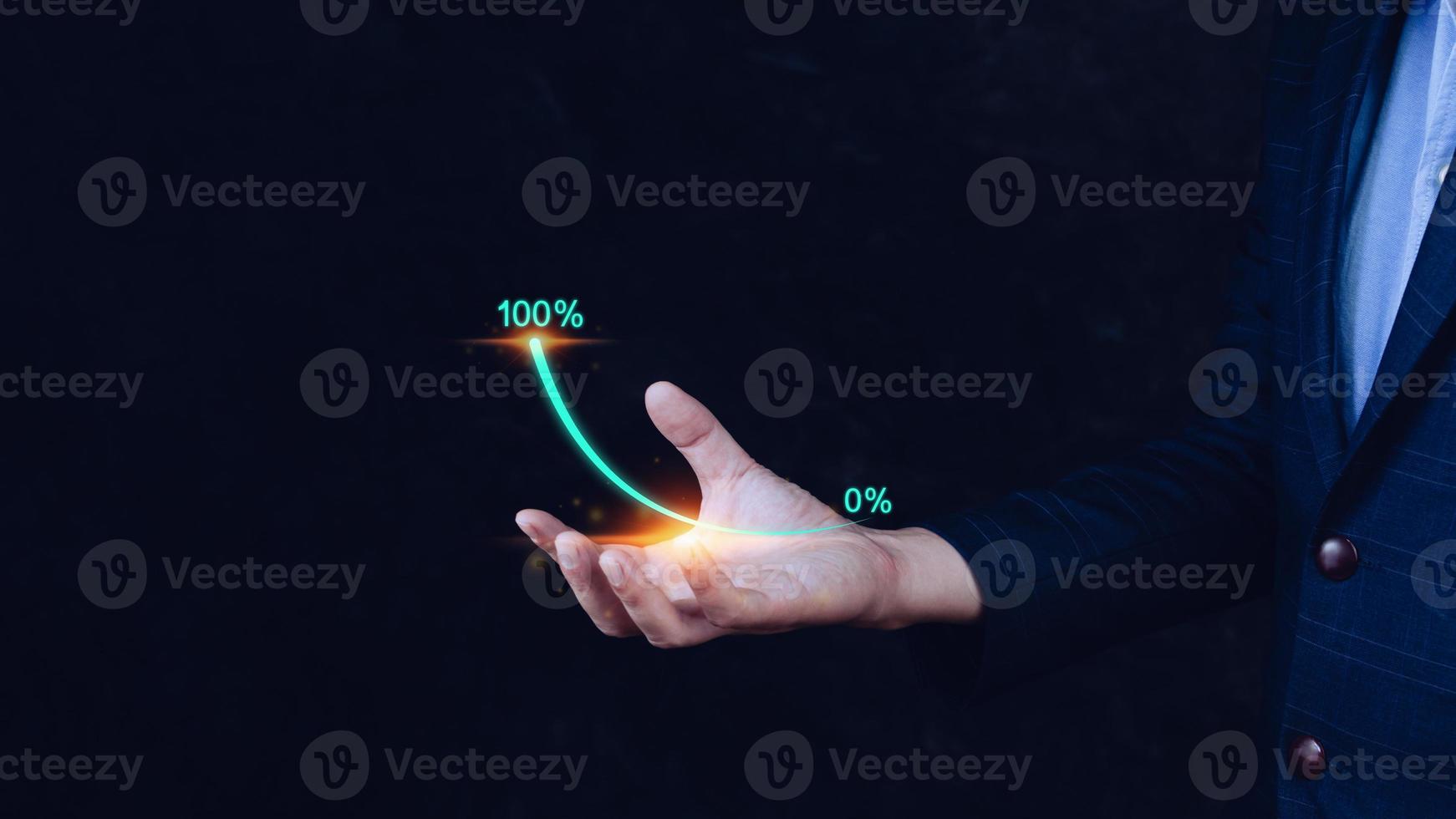 Businessman showing a growing virtual hologram stock, invest in trading. planning and strategyto that has grown exponentially rapidly from 0 percent to 100 percent sales. photo