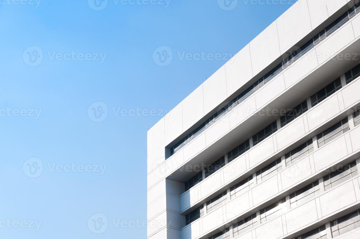 New building architecture on blue sky background,Low angle architectural exterior view of modern photo