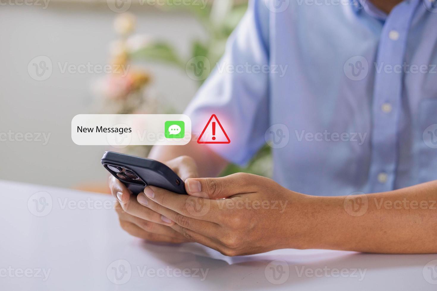 Businessman using smartphone with new message electronic email hacking and spam warning symbol. cyber attack network, virus, spyware, Cyber security and cybercrime. photo