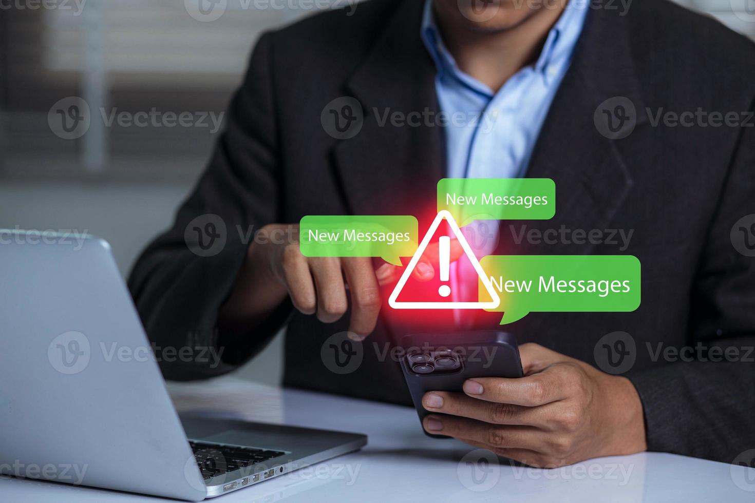 Businessman using smartphone with new message electronic email hacking and spam warning symbol. cyber attack network, virus, spyware, Cyber security and cybercrime. photo