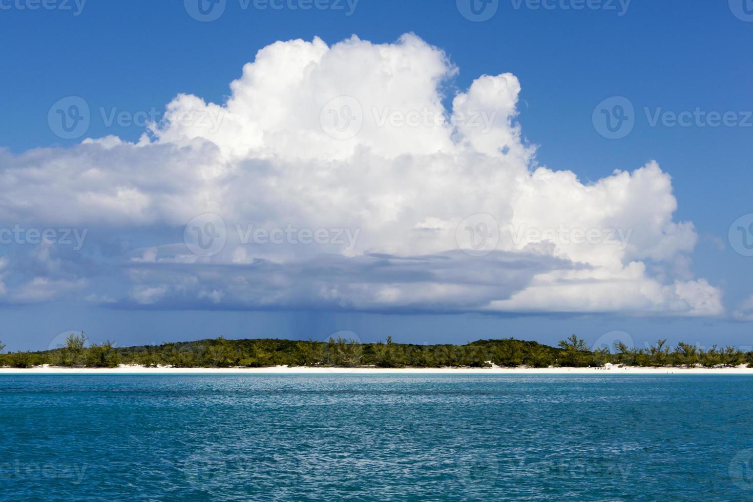 Half Moon Cay Island And A Rainy Cloud photo