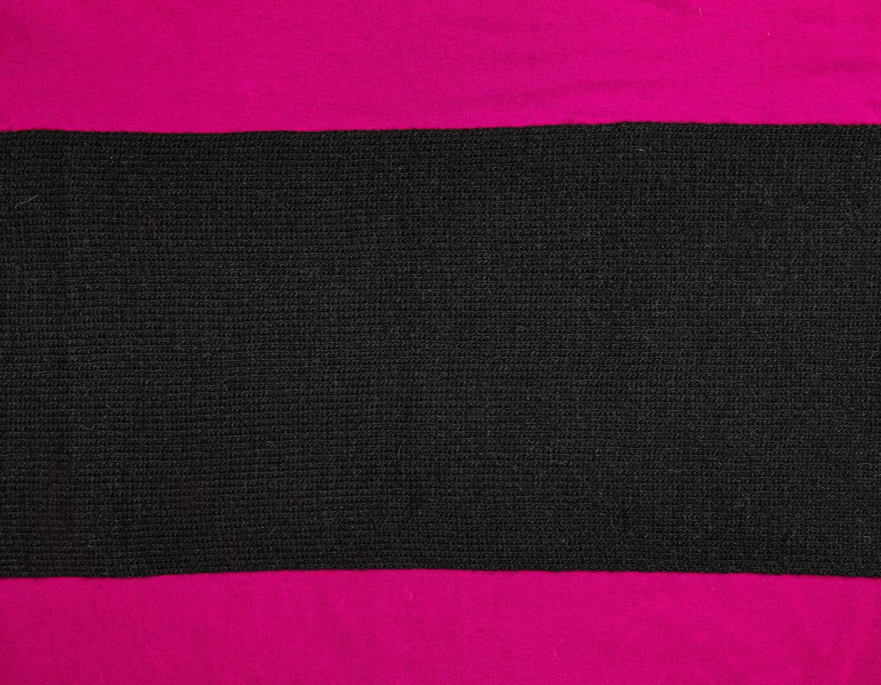 Textile geometric background from fabrics. Black and red fabric as texture background. Smooth fabric background with free space for text. photo