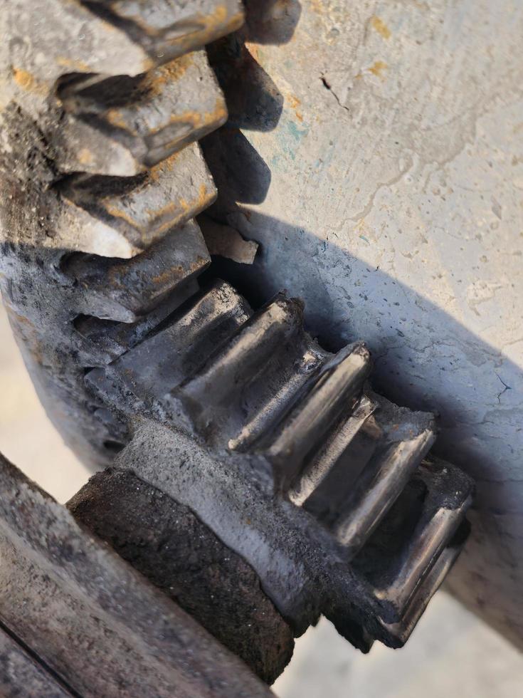 The gearing mechanism of the gearbox of a small concrete mixer. photo