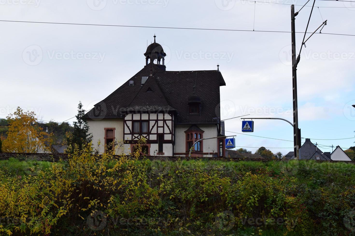 half-timbered od building at the railroad photo