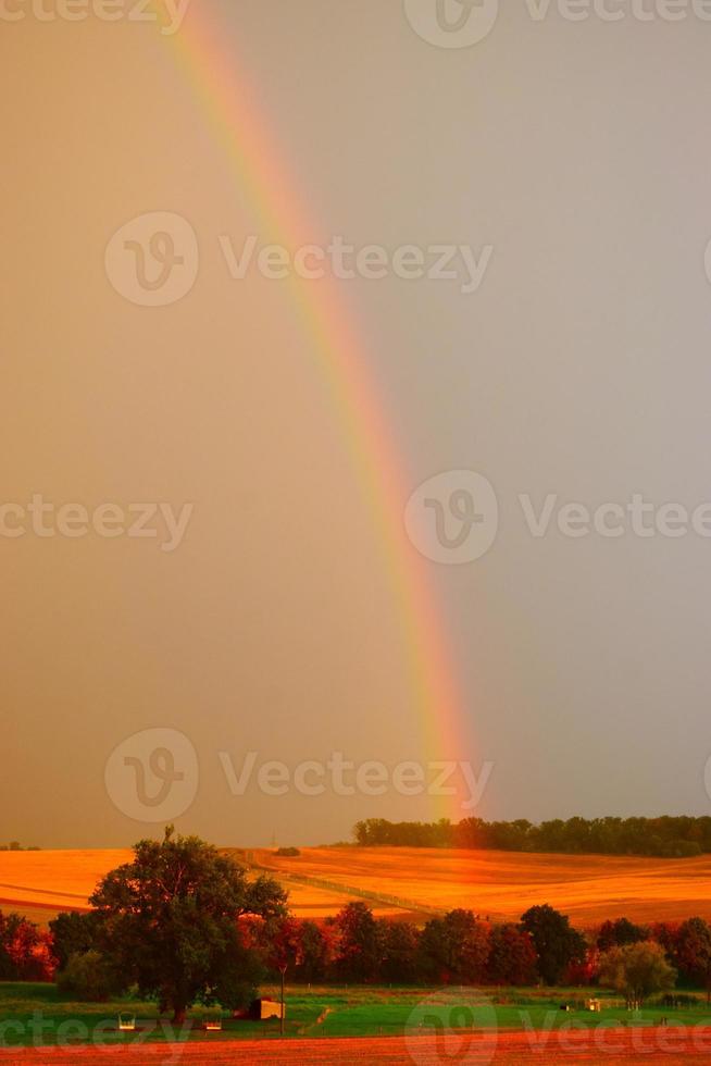 rainbow at sunset in the Eifel photo