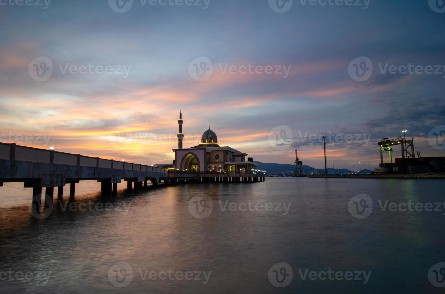 Butterworth, Malaysia floating mosque with dramatic sunset cloud photo