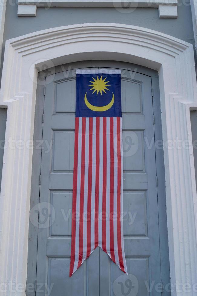 Malaysia flag banner at door photo