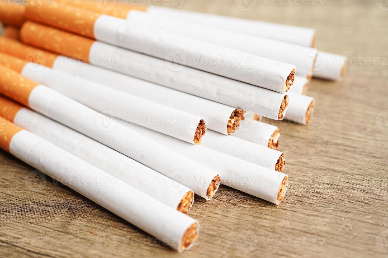 Cigarette, roll tobacco in paper with filter tube, No smoking concept. photo