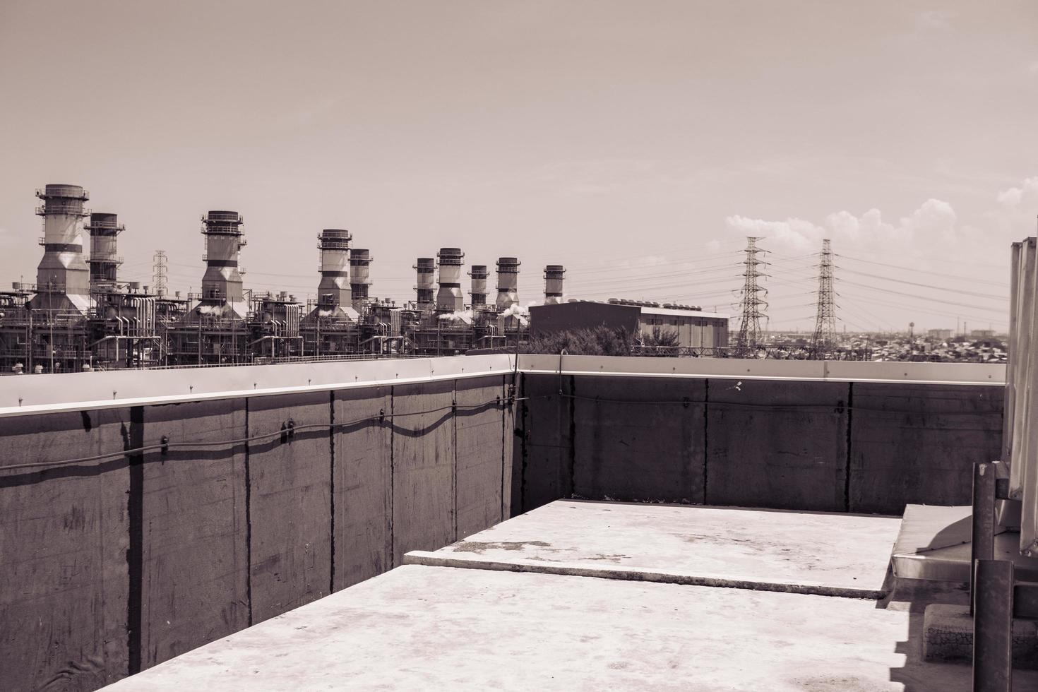 combine cycle project power plant when day time with sky and cloudy vibes.  The photo is suitable to use for industry background photography, power plant poster and electricity content media.