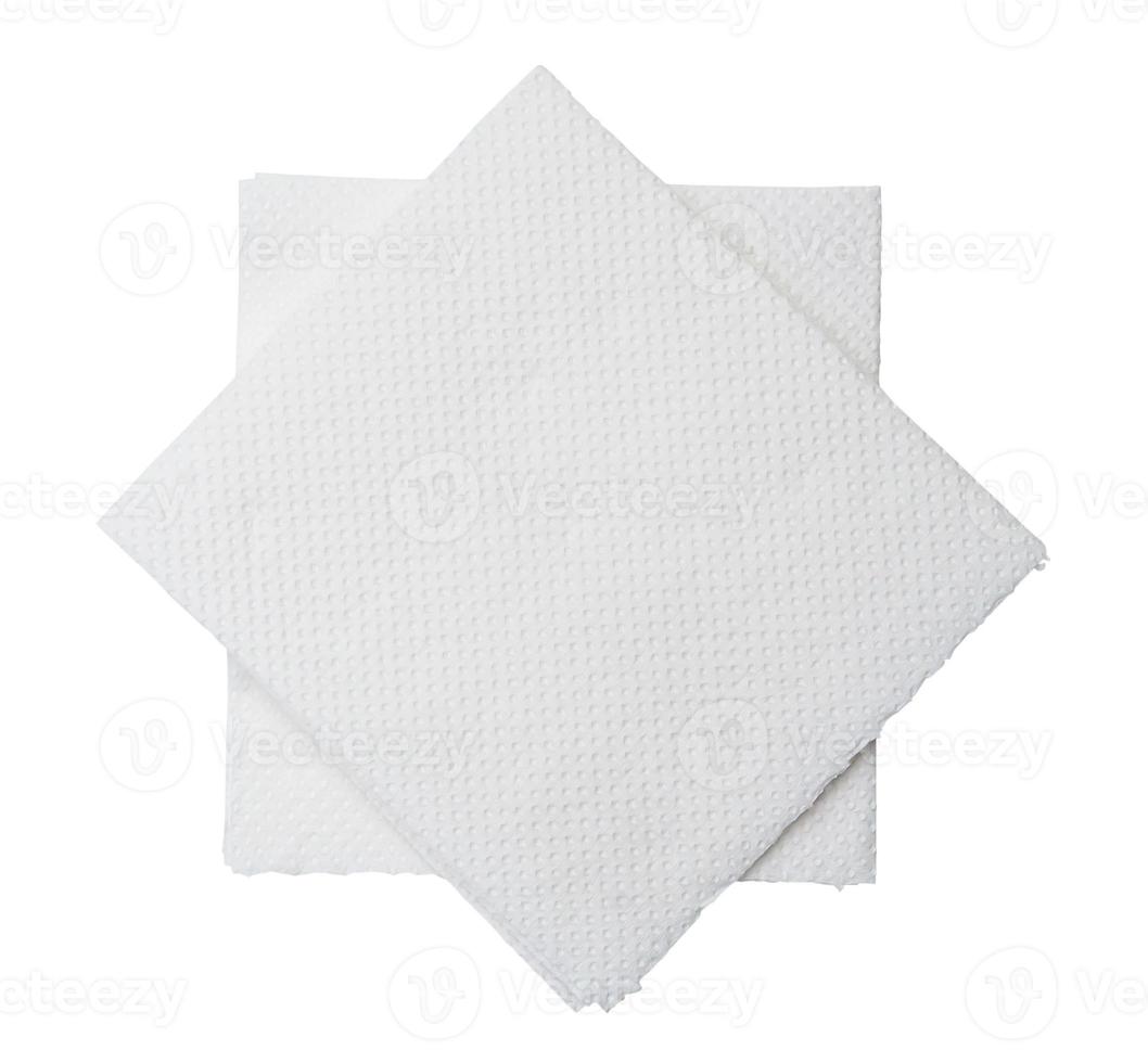 Two folded pieces of white tissue paper or napkin in stack prepared for use in toilet or restroom isolated on white background with clipping path photo