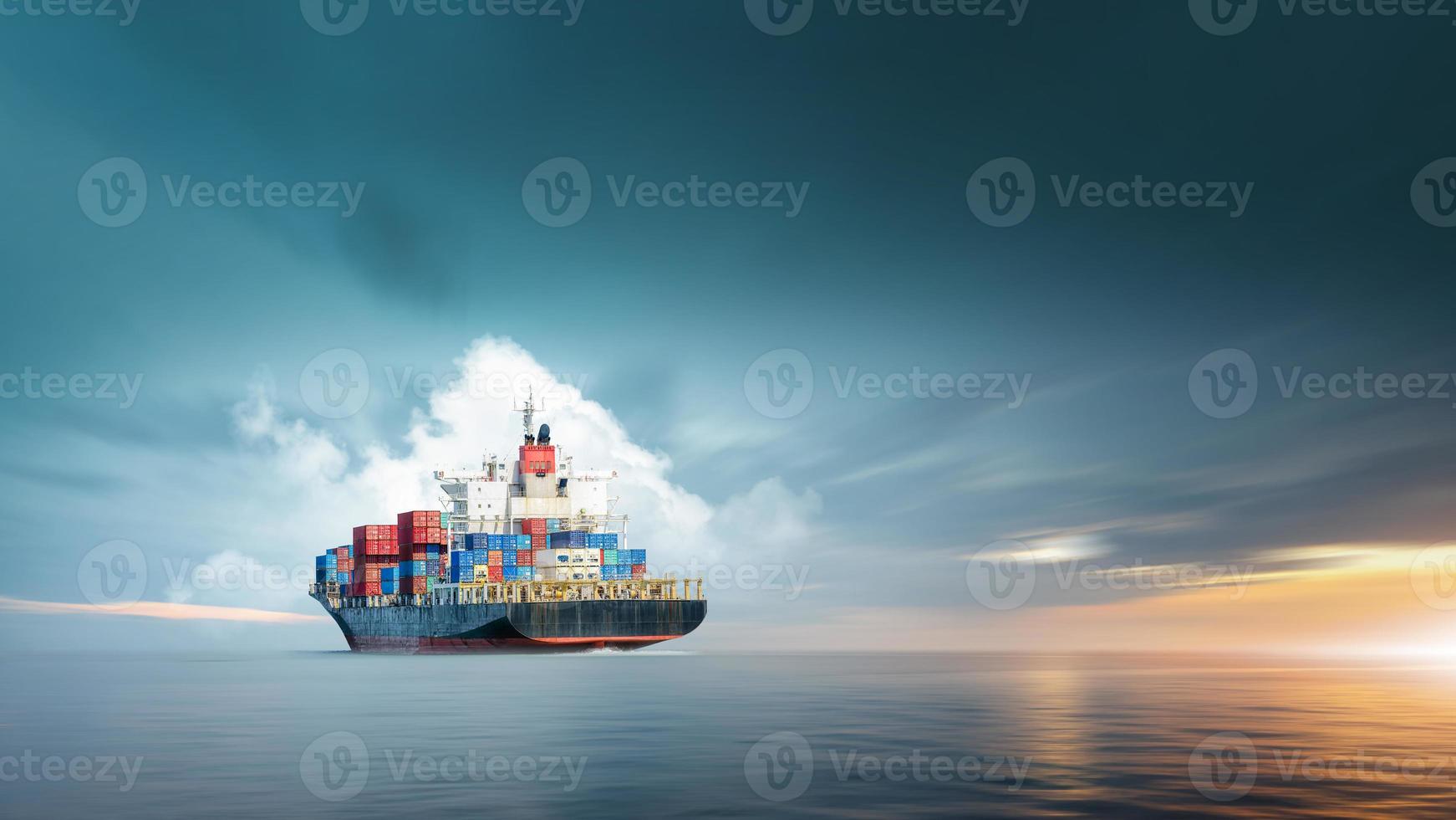 Container cargo ship in ocean at sunset dramatic sky background with copy space, Nautical vessel and sea freight shipping, International global business logistics transportation import export concept photo