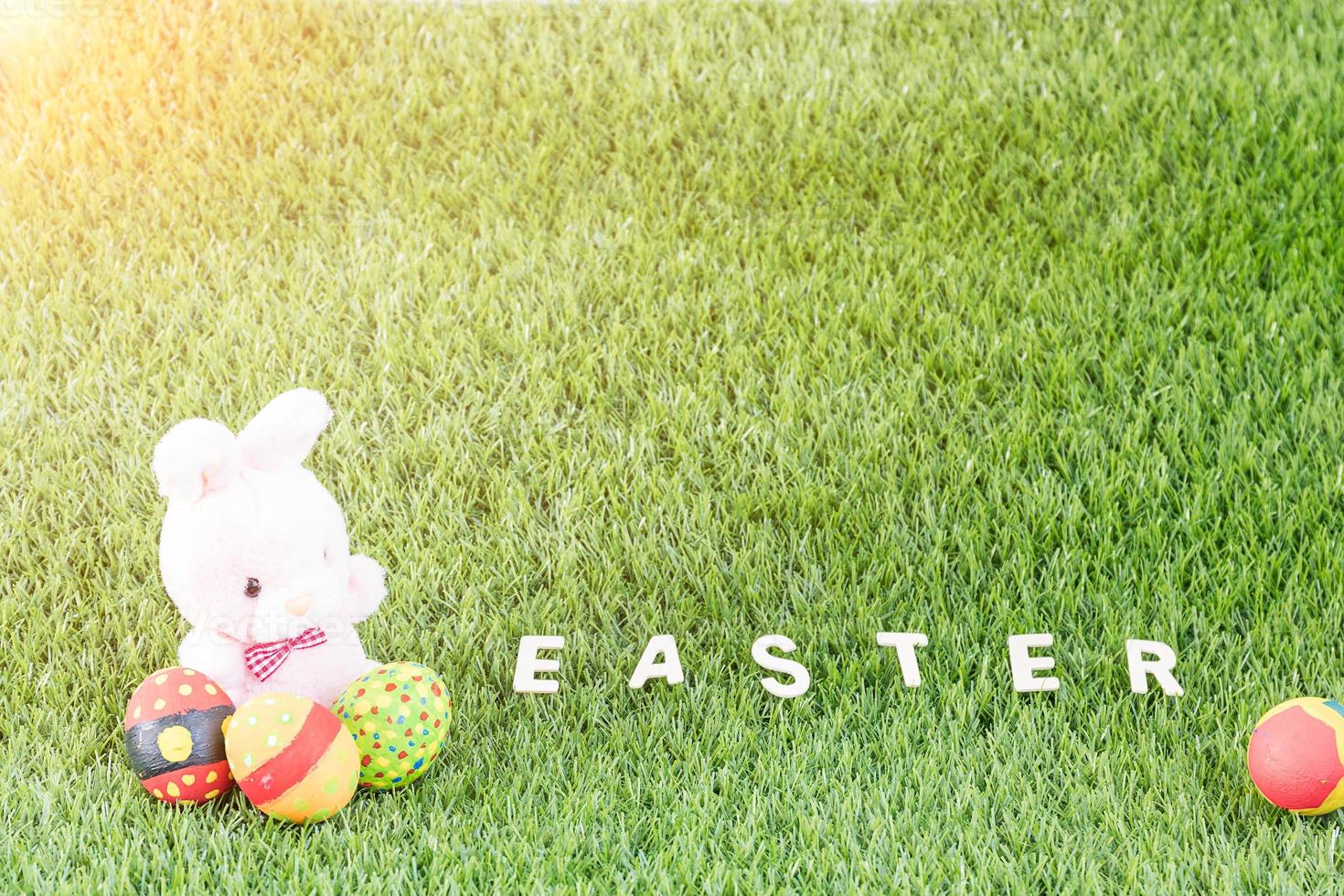 Bunny toys and Easter eggs with text photo