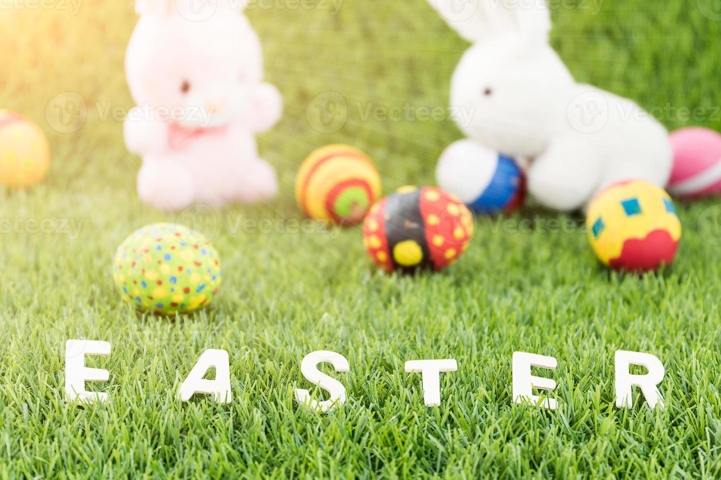 Bunny toys and Easter eggs with text photo