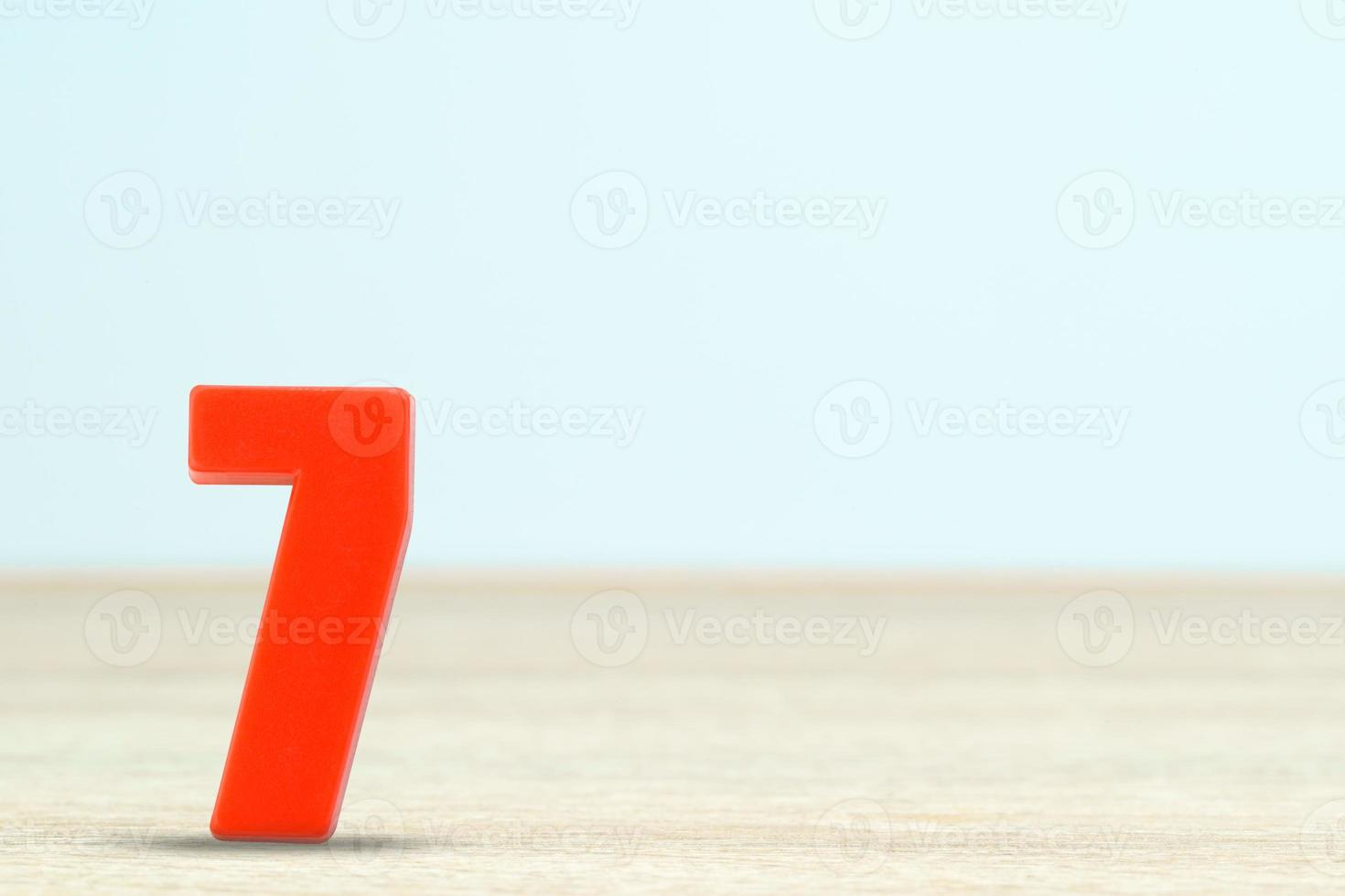 Shot of a number seven made of red plastic photo