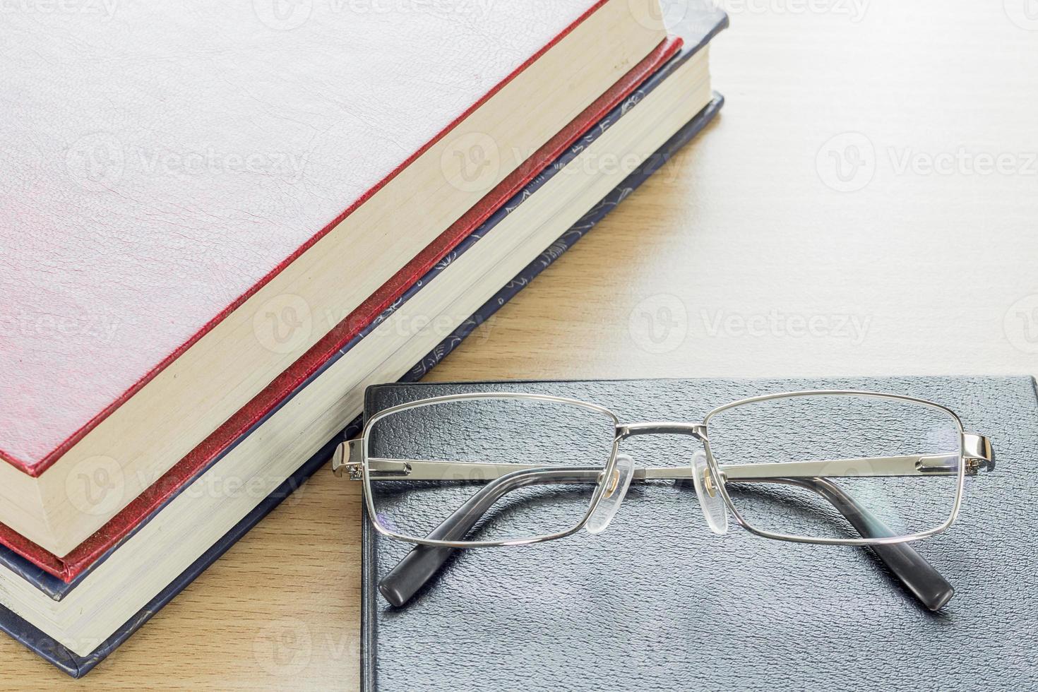 Glasses put on notebook photo