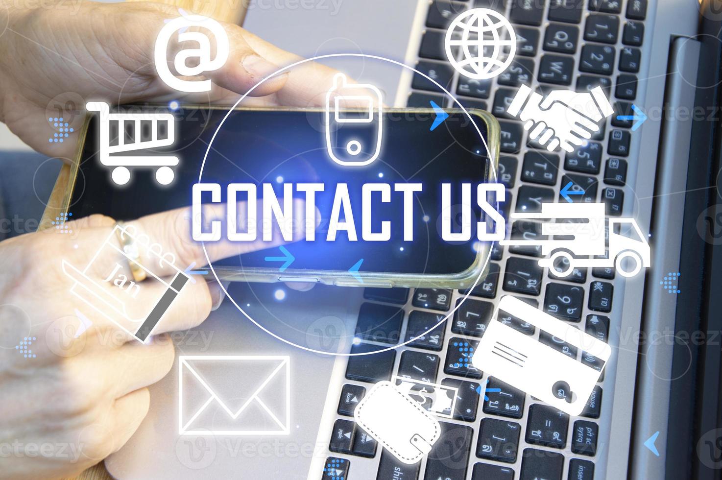 Contact us or our customer support hotline where people connect. and touch the contact icon on the virtual screen photo