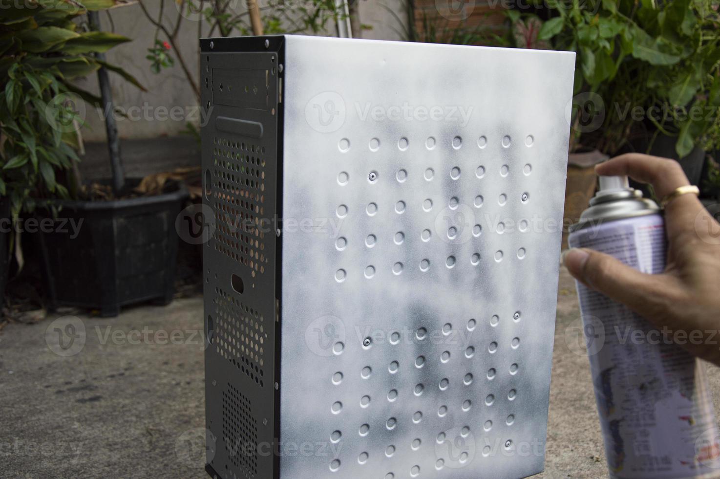 side view Worker spraying white paint 21662271 Stock Photo at Vecteezy