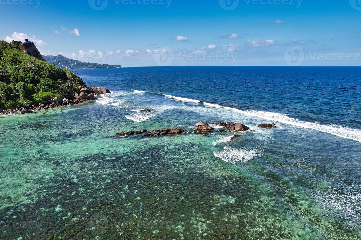 Rock in the center of the ocean, Mahe Seychelles photo