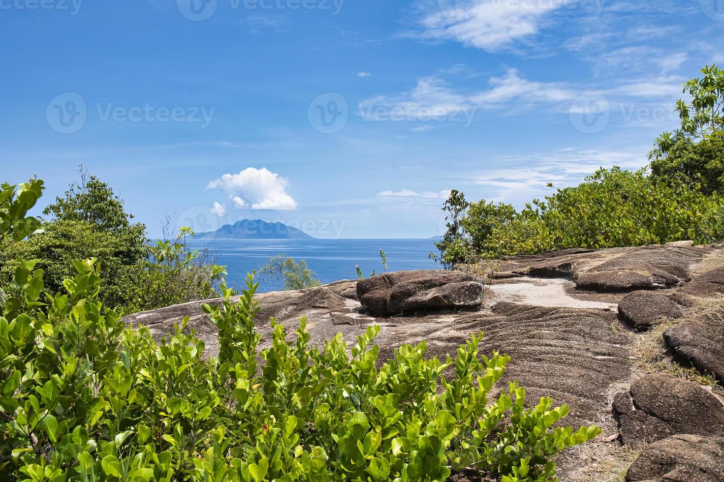 Anse major nature trail,huge granite rock, view of Silhouette island photo