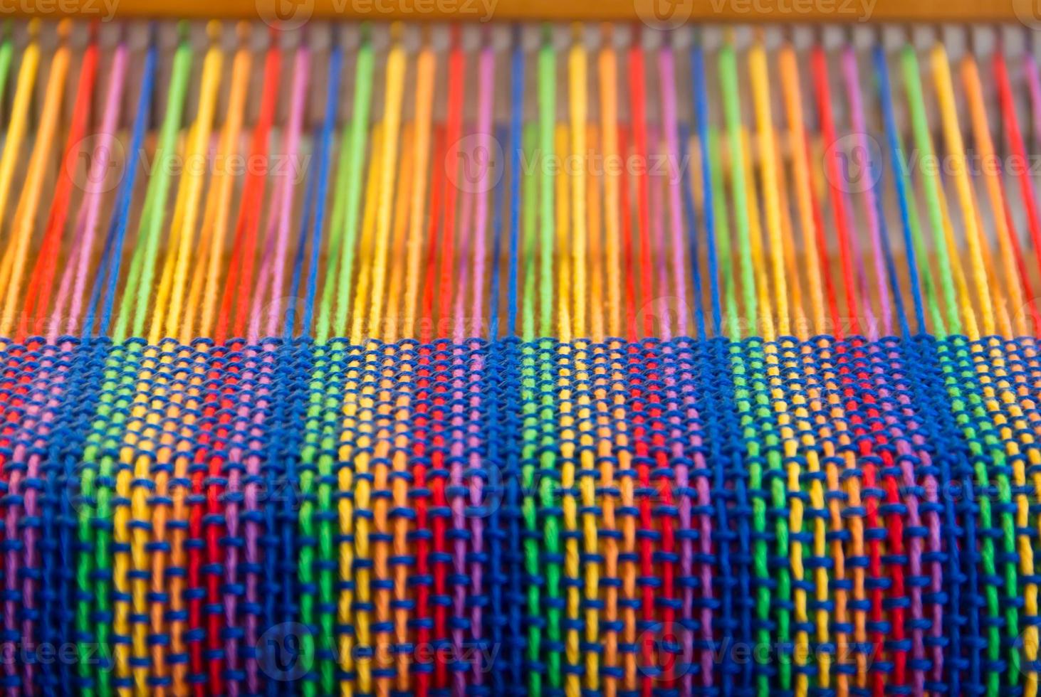 Comb loom with rainbow colors and diversity flag photo