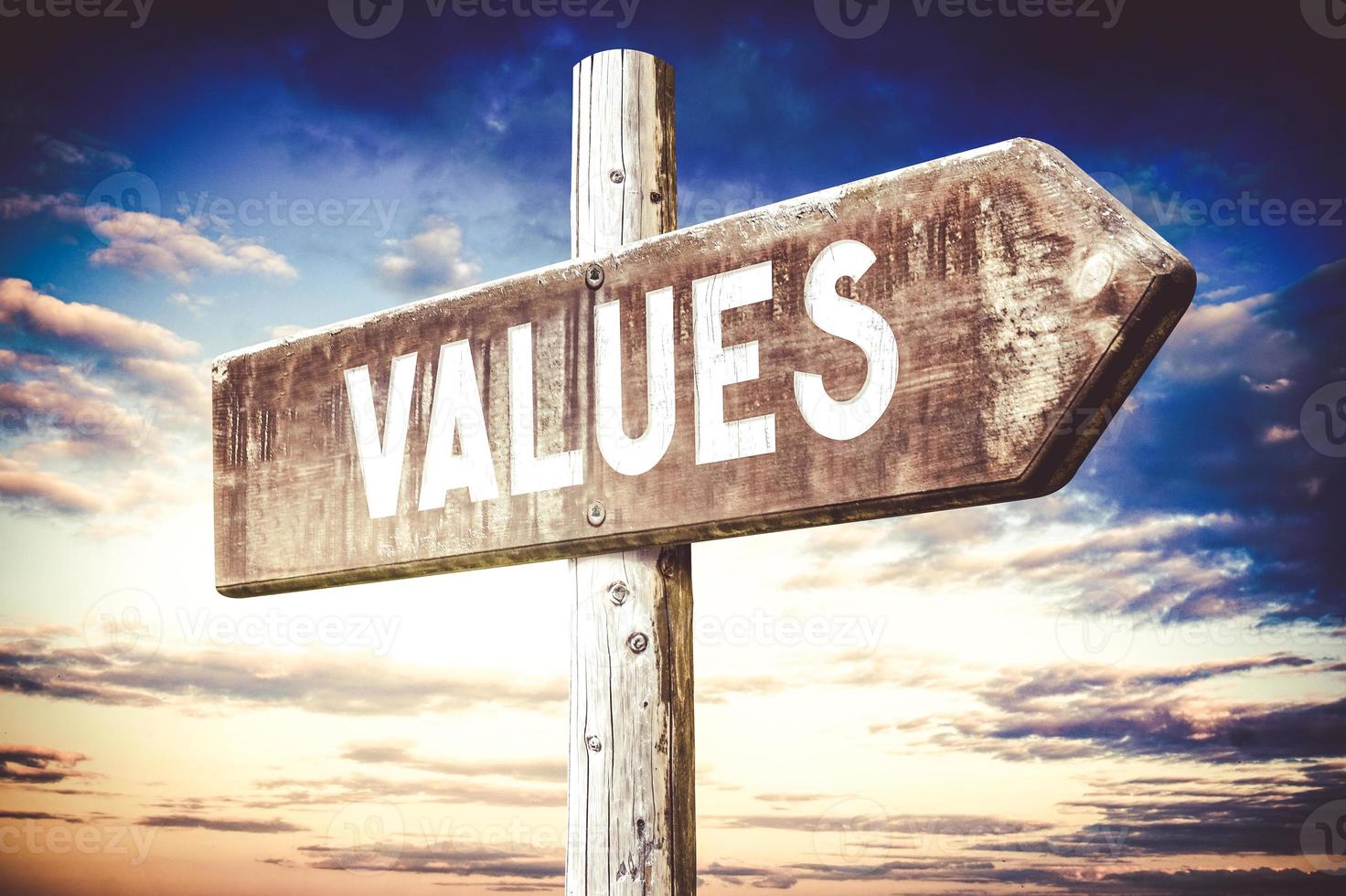 Values - Wooden Signpost with one Arrow, Sunset Sky in Background photo