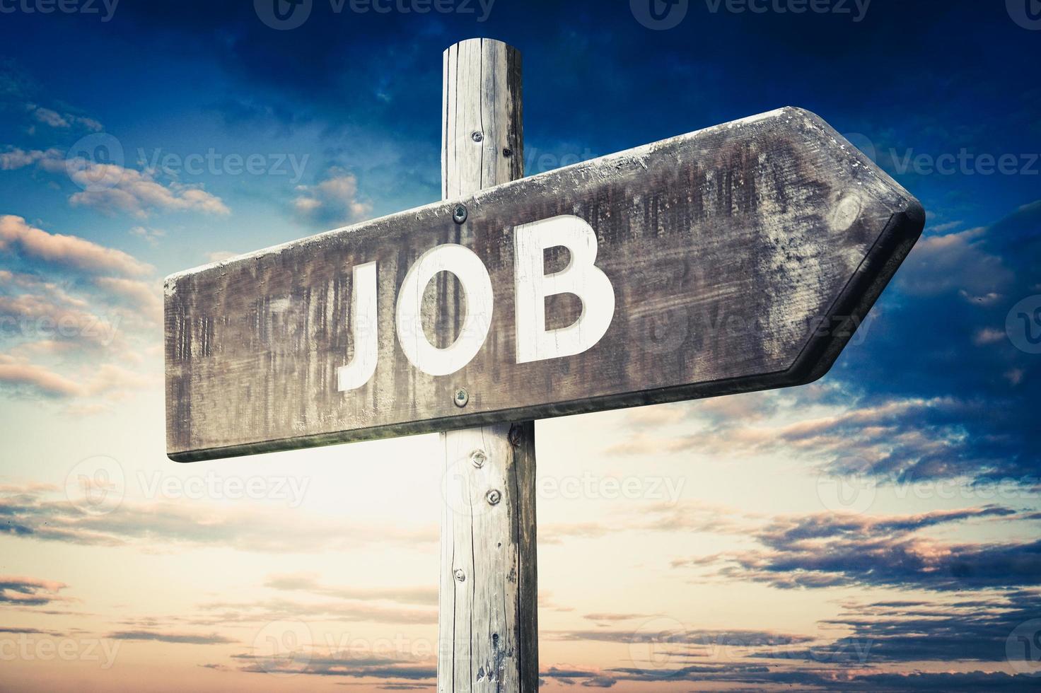 Job - Wooden Signpost with one Arrow, Sunset Sky in Background photo