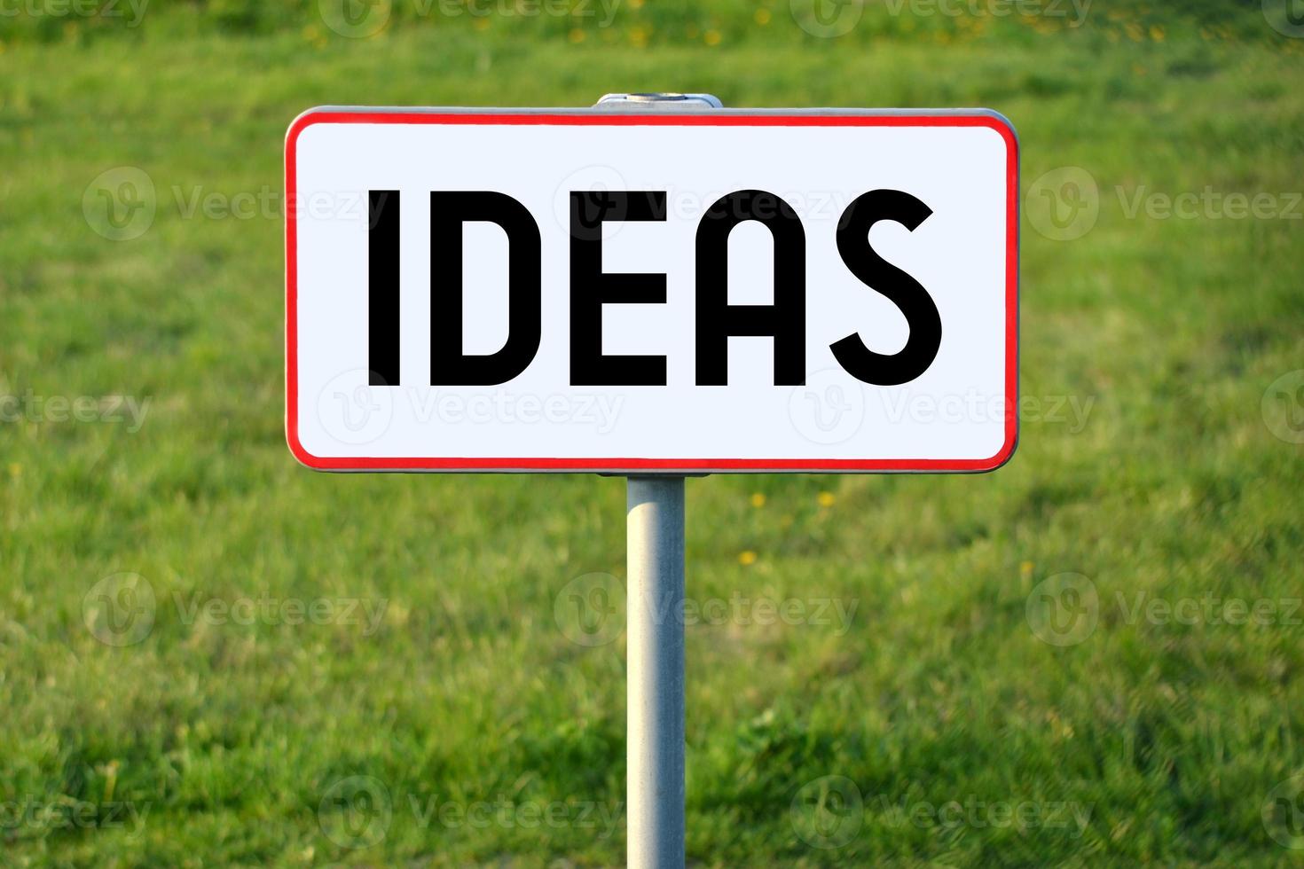 Ideas - White Sign on a Grass photo
