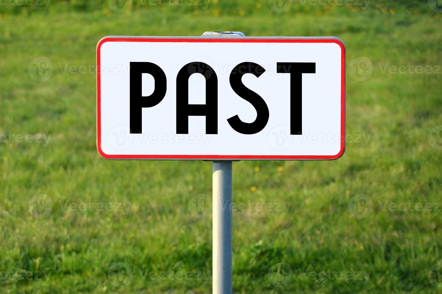 Past - White Sign on a Grass photo