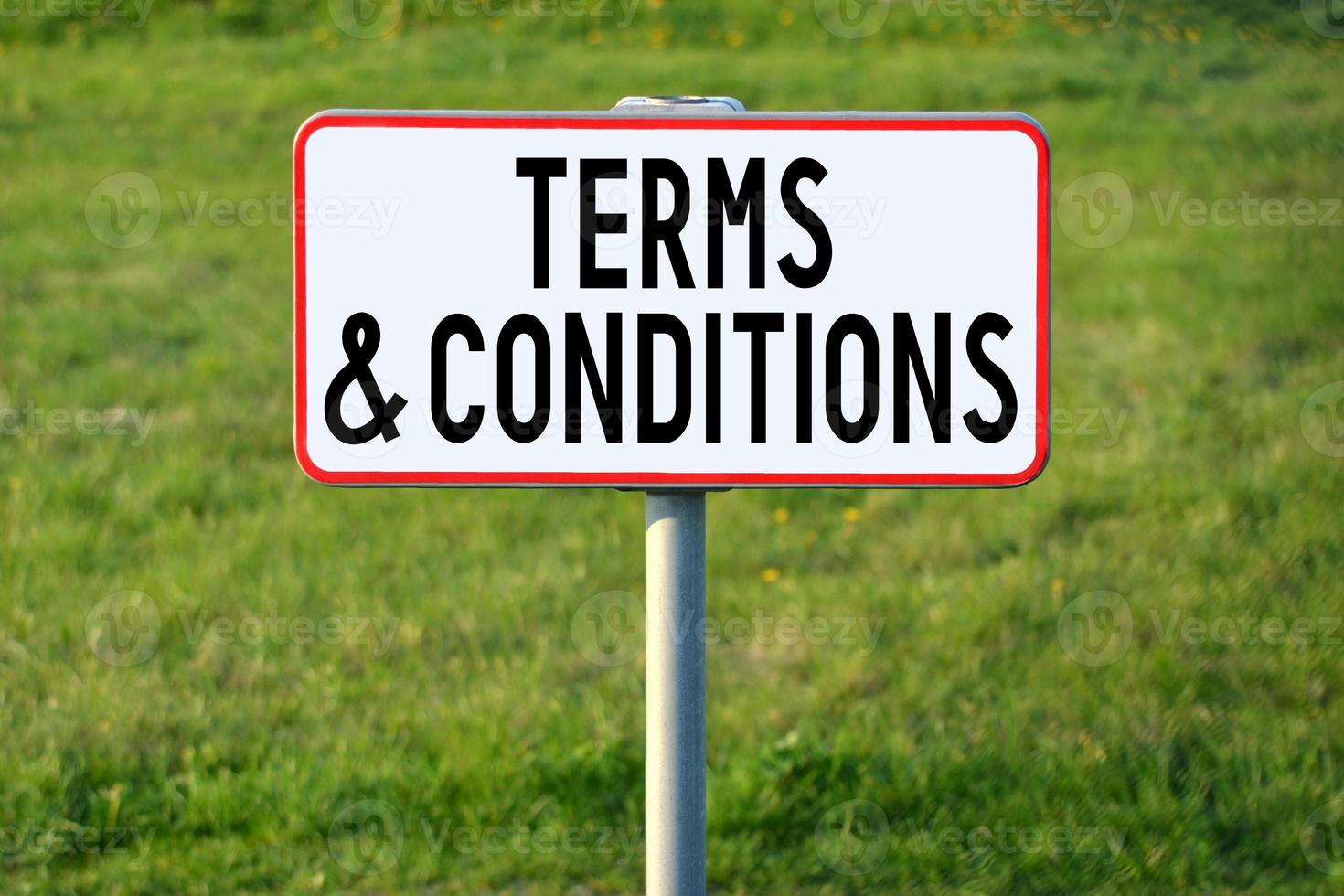Terms and Conditions - White Sign on a Grass photo