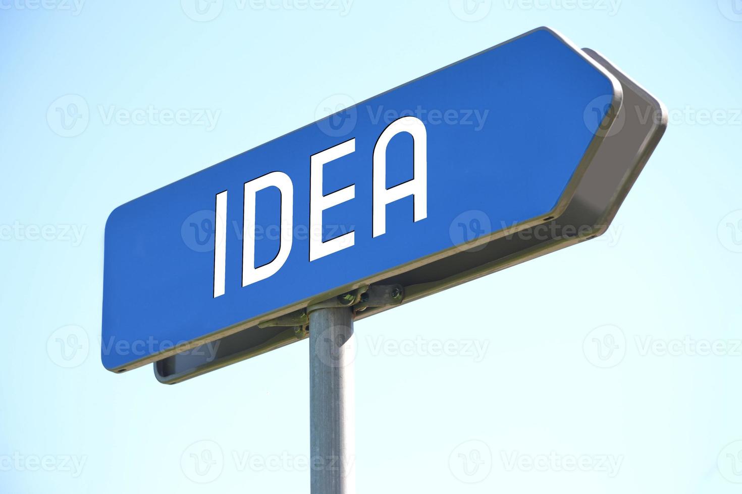 Idea - Blue Metal Signpost and Sky in Background photo