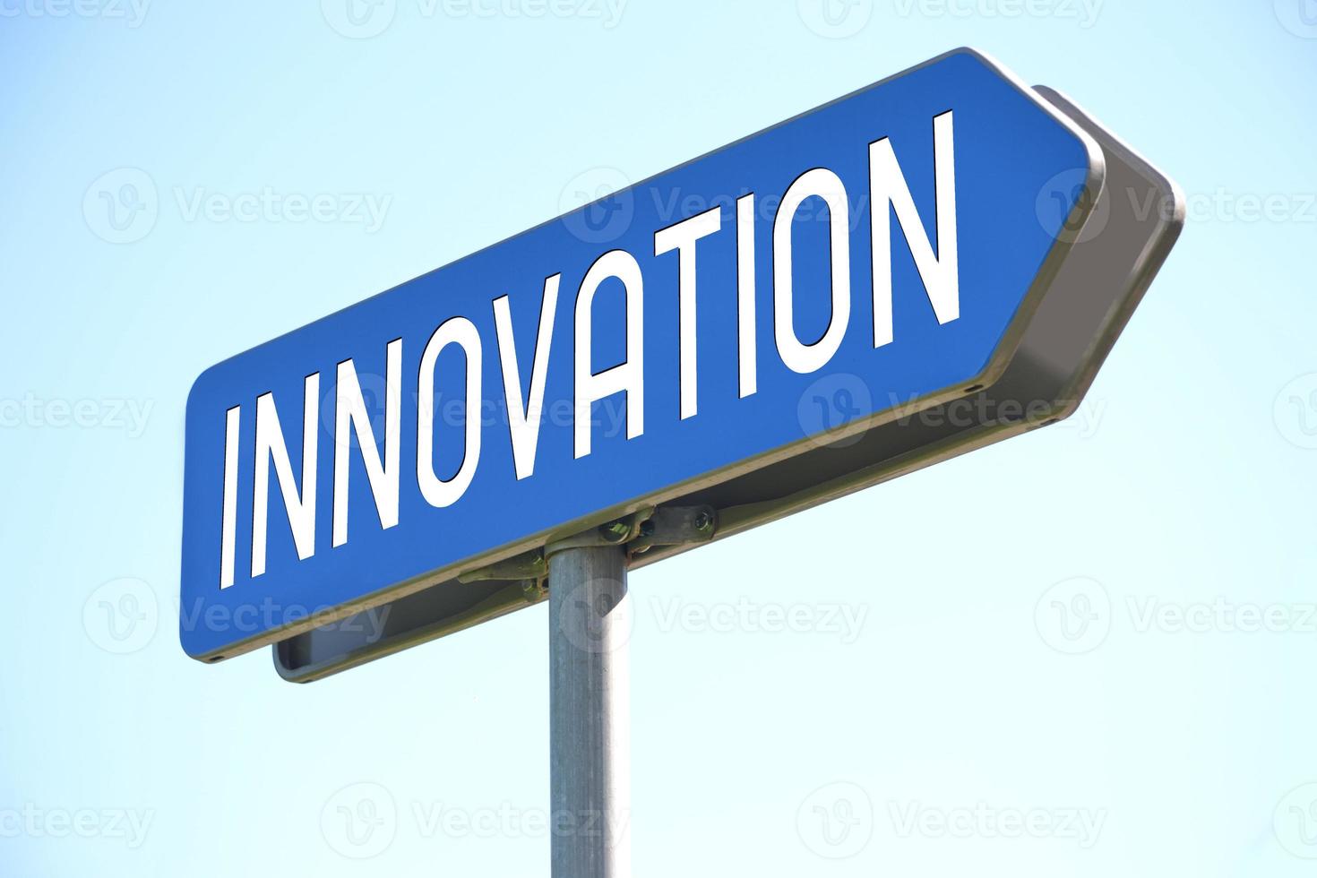Innovation - Blue Metal Signpost and Sky in Background photo