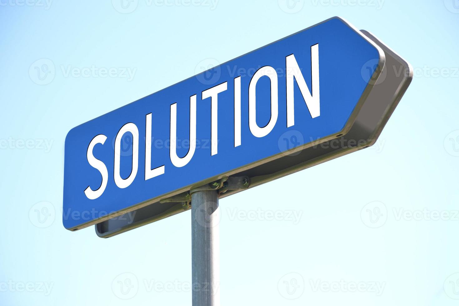Solution - Blue Metal Signpost and Sky in Background photo