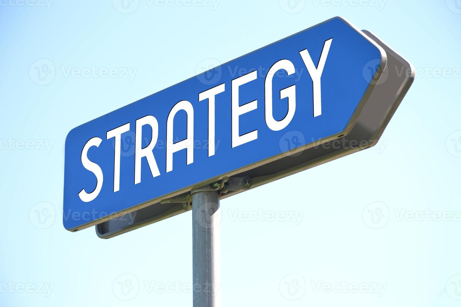 Strategy - Blue Metal Signpost and Sky in Background photo