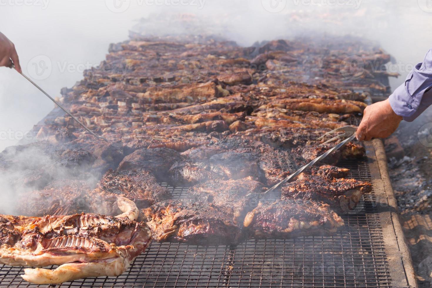 traditional meat grilled on the grill in the Argentine countryside photo