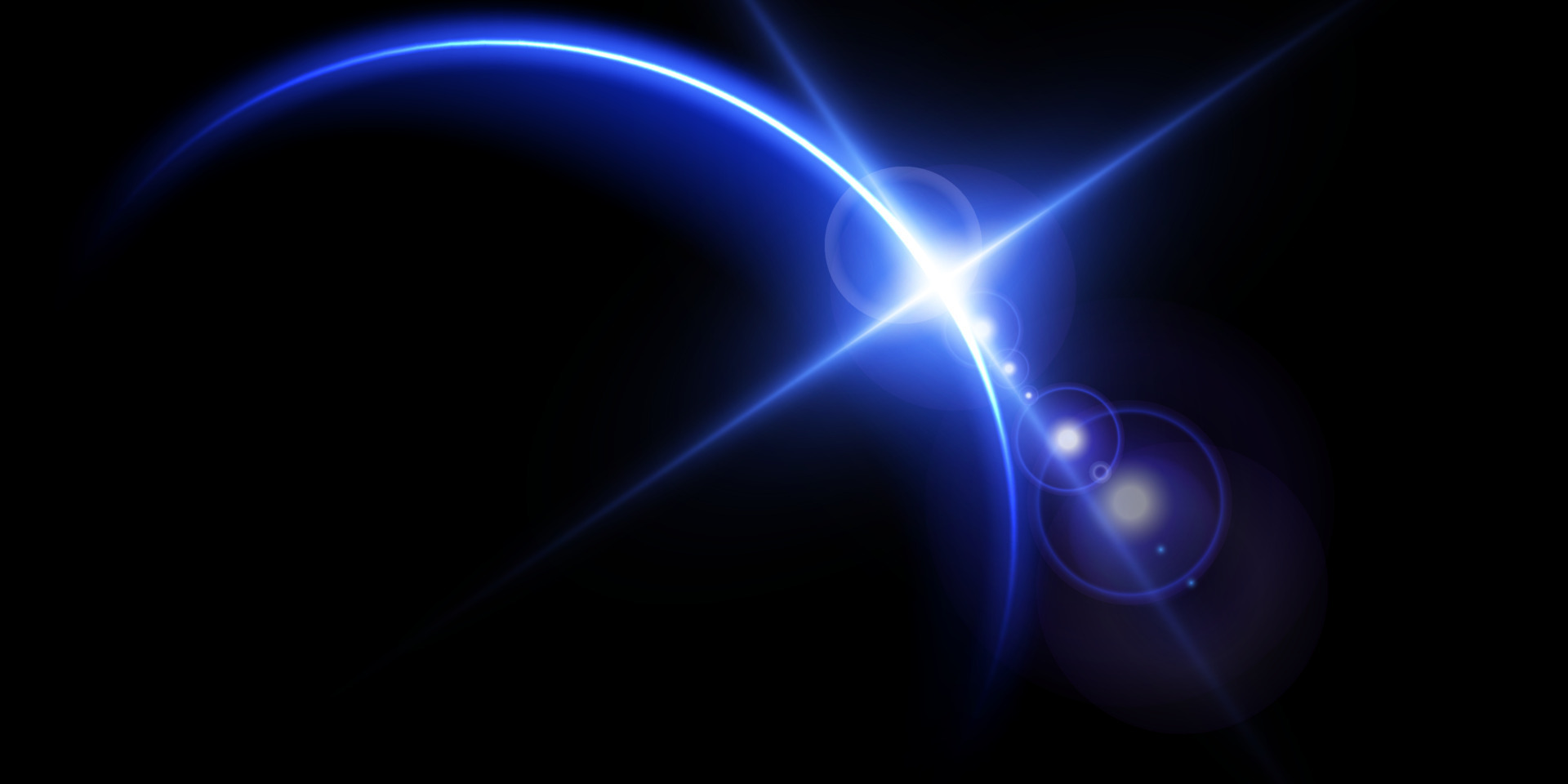 The edge of a blue solar eclipse on a black background. Blue eclipse