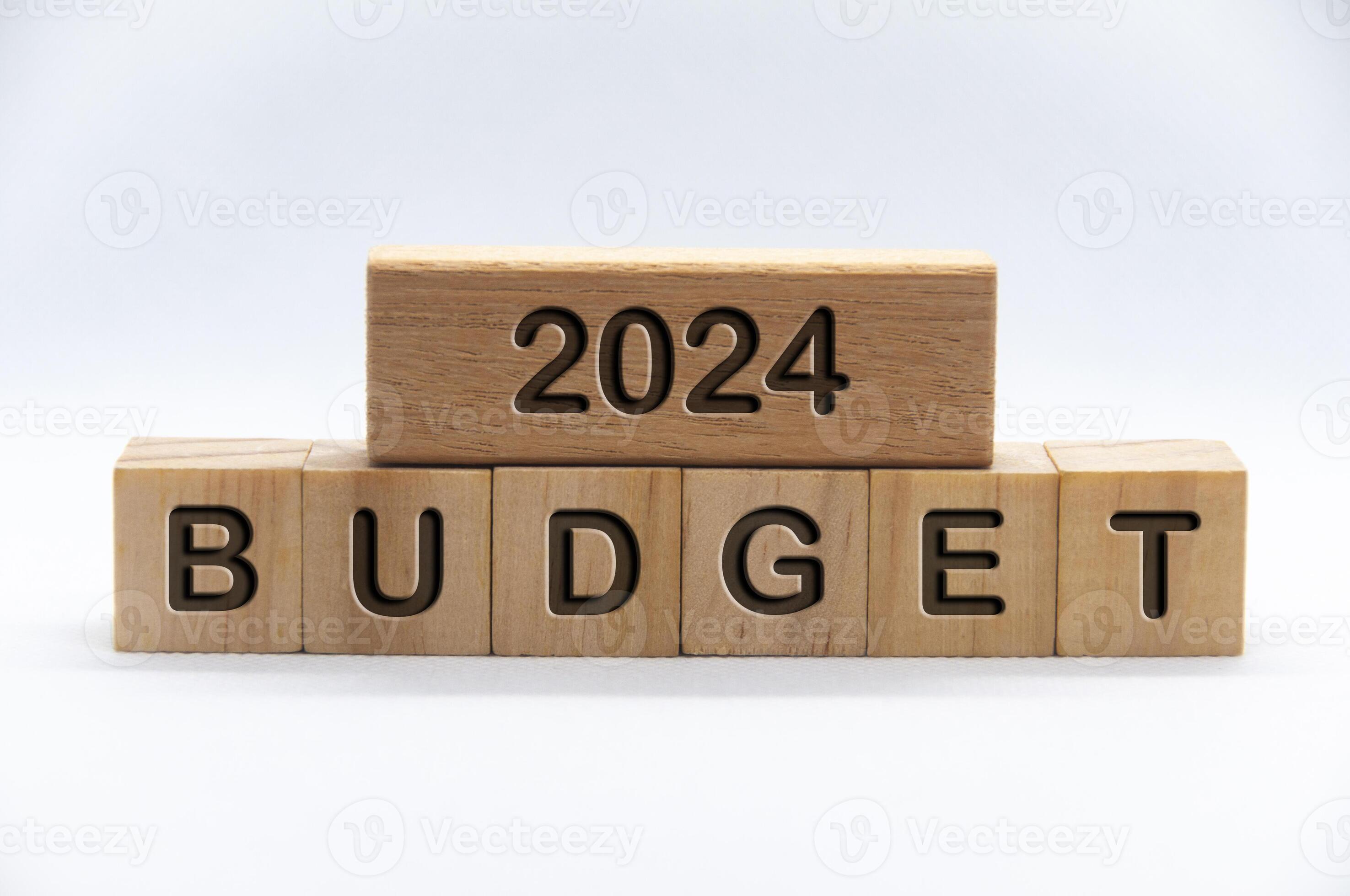 Budget 2024 text engraved on wooden blocks with white cover background