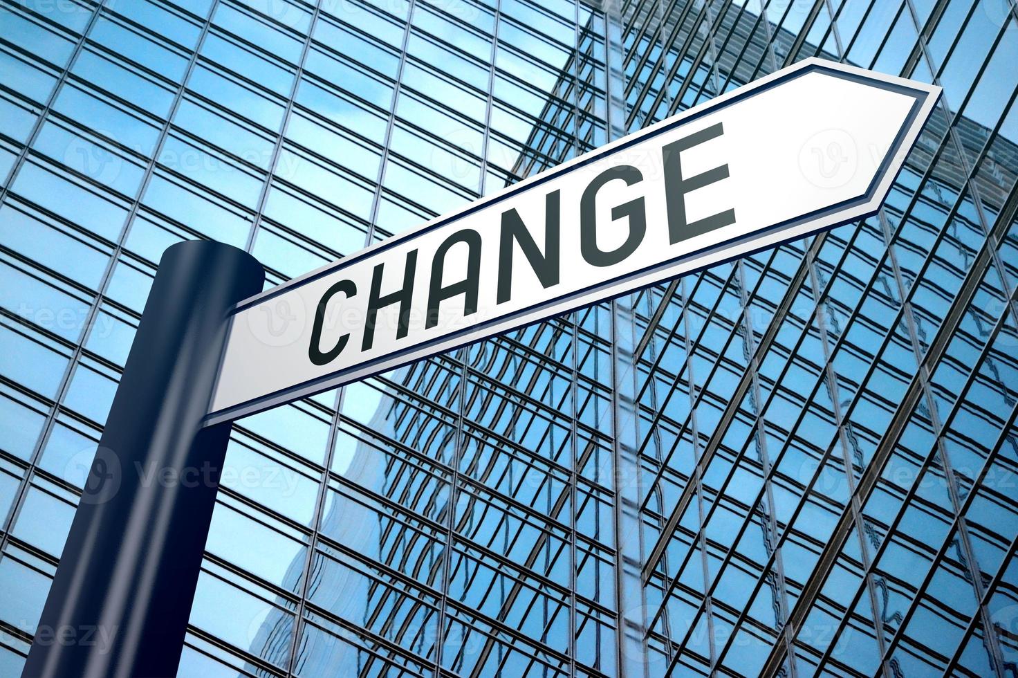 Change - Signpost With One Arrow, Modern Office Building in Background photo