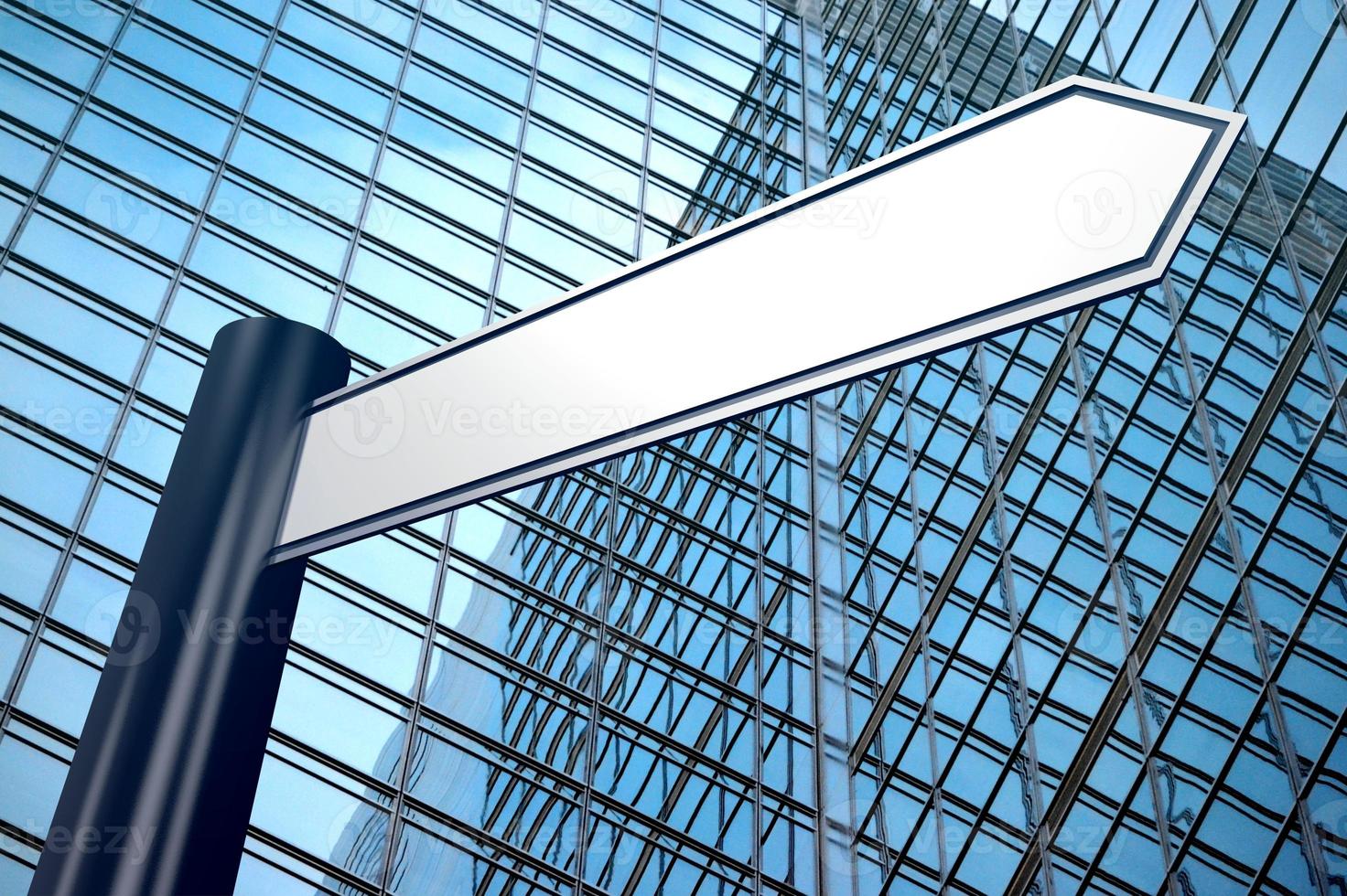 Empty Signpost With One Arrow, Modern Office Building in Background photo