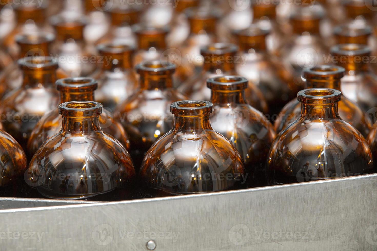 Glass bottles in a factory for the production of medical and veterinary drugs. photo